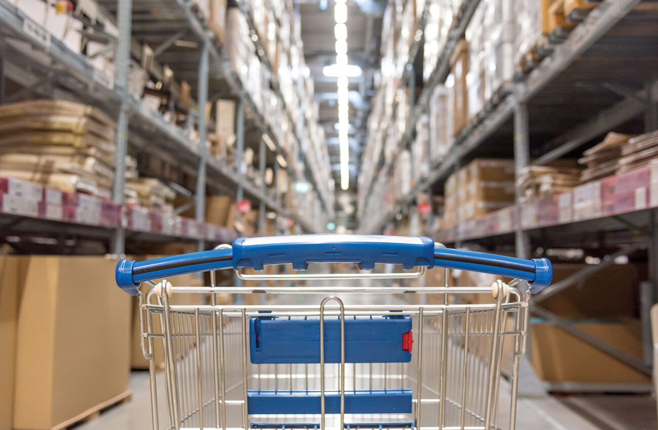 Warehouse storage of retail merchandise shop. Trolley Shopping C